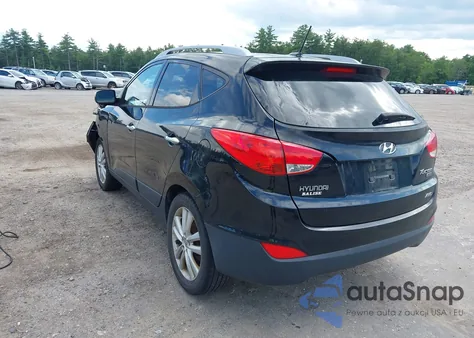 2010 Hyundai Tucson Limited z USA, uszkodzony, nr VIN KM8JUCAC0AU047182